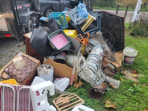 Pile of household junk staged for pickup by Cary Junk Removers in Cary, NC